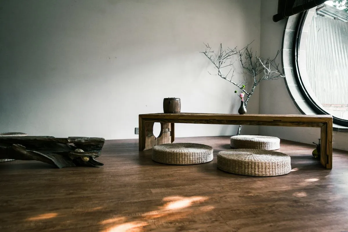 Sunlit close-up of a minimal home interior and wooden tray