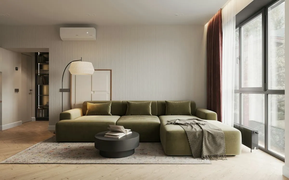 Warm contemporary living room with low seating and framed artwork